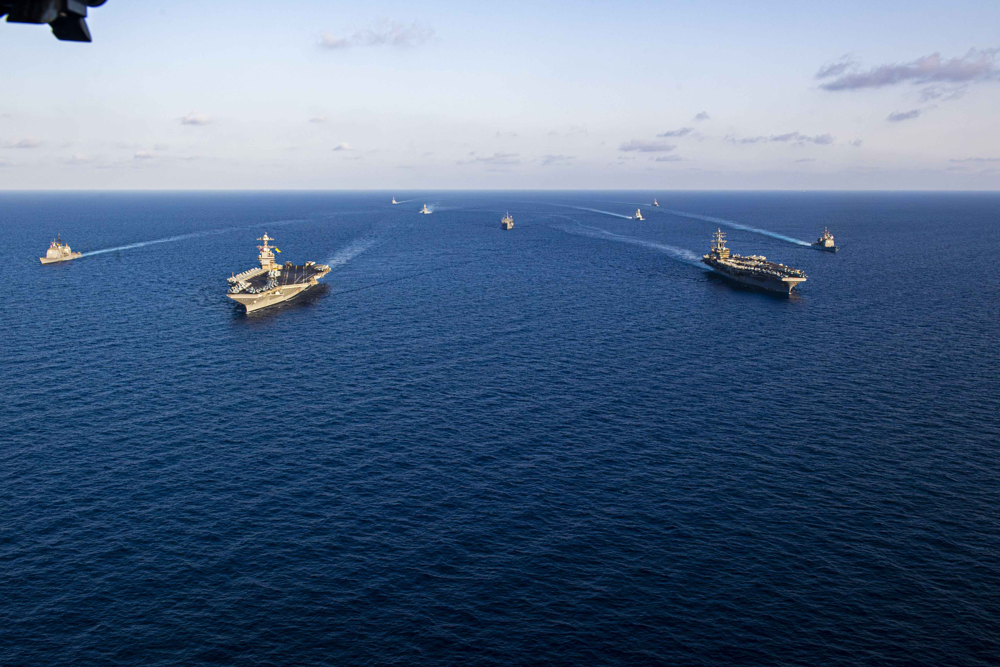Gerald R. Ford and Dwight D. Eisenhower Carrier Strike Groups Support Operations in the Mediterranean Sea, source:https://commons.wikimedia.org/wiki/File:231103-N-JC256-1301_Gerald_R._Ford_and_Dwight_D._Eisenhower_Carrier_Strike_Groups_Support_Operations_in_the_Mediterranean_Sea.jpg
